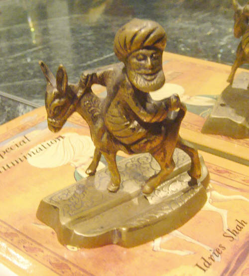 Sufi Nasruddin on his famous 'back-to-front donkey', Bought by, Photo by & Copyright 2011 by Bobby Matherne